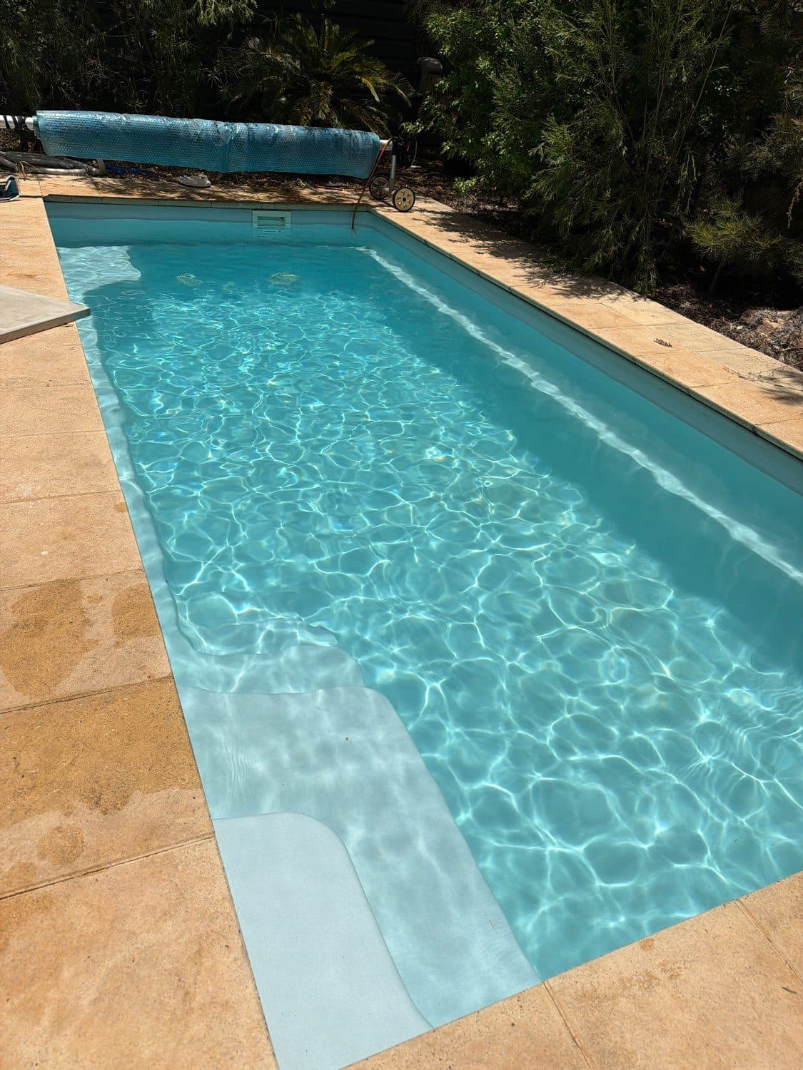 Clear, balanced pool after green pool recovery